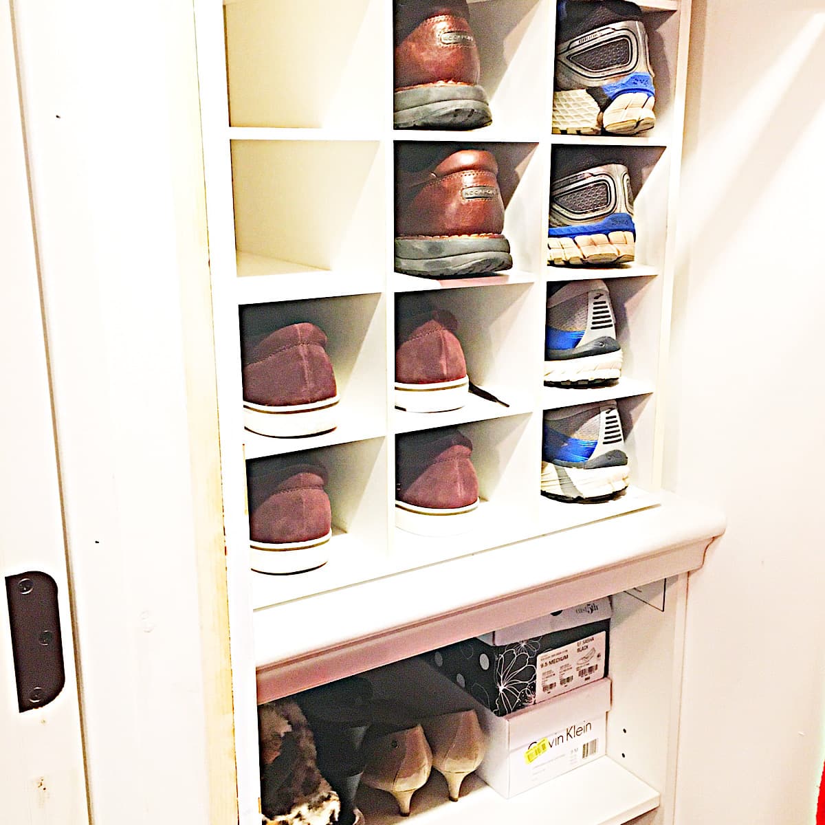 shoe organizer and shelving in reach in closet remodel