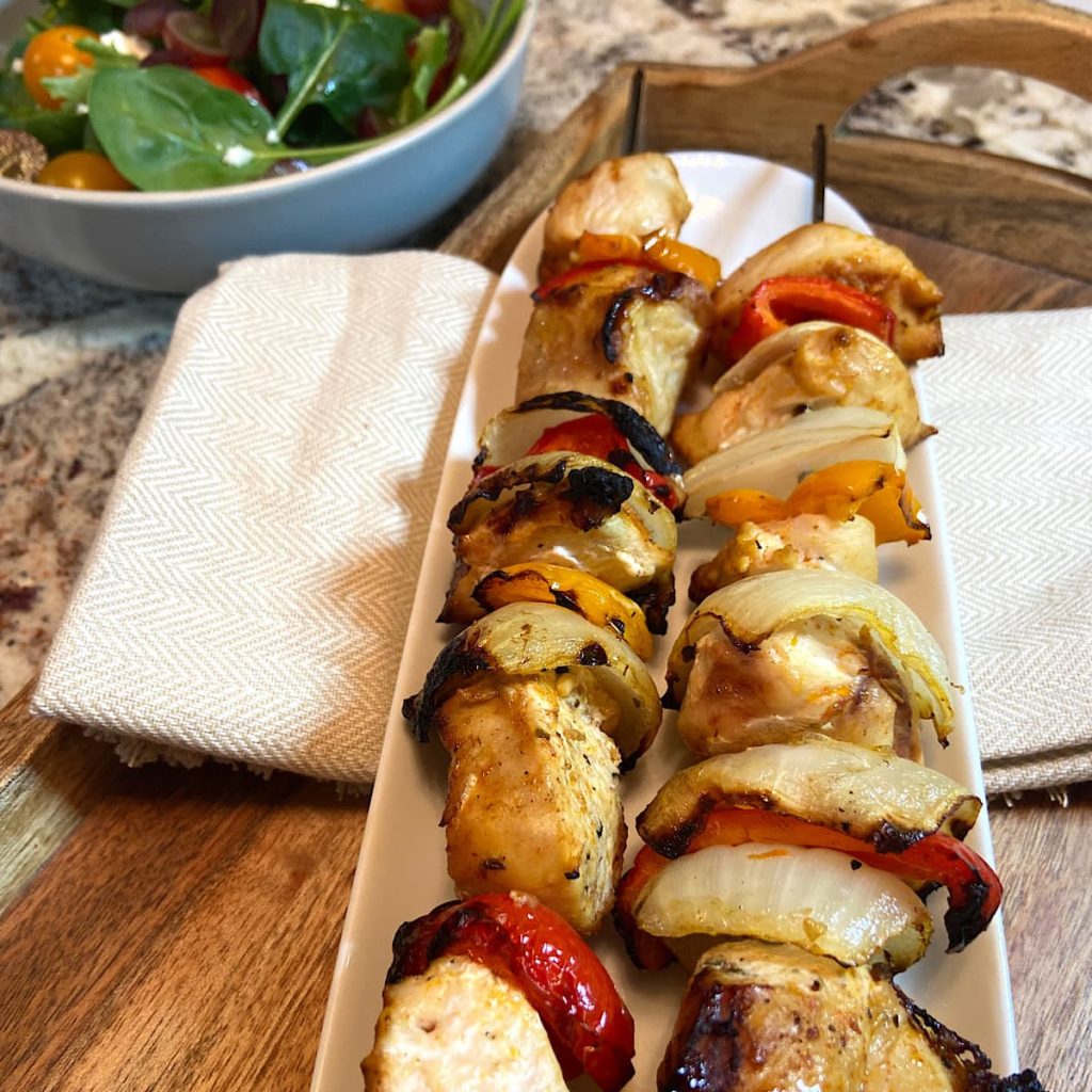 tasty chicken kabobs made with onion and peppers