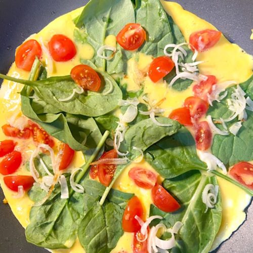 vegetable omelet layered in ingredients
