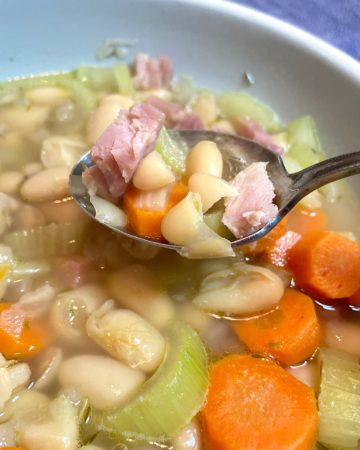 a hearty spoonful of ham and bean soup