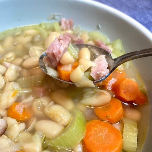 a hearty spoonful of ham and bean soup