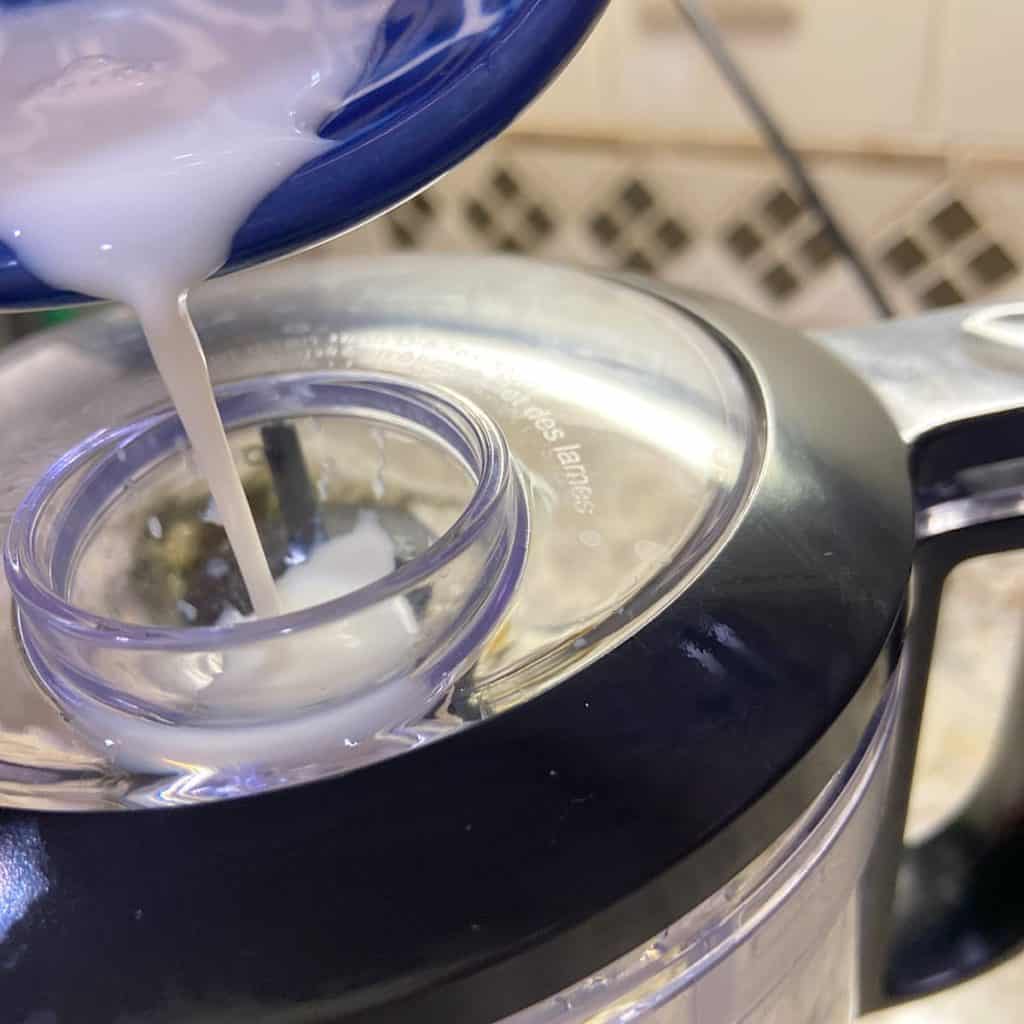 drizzle milk into chopper to desired consistency