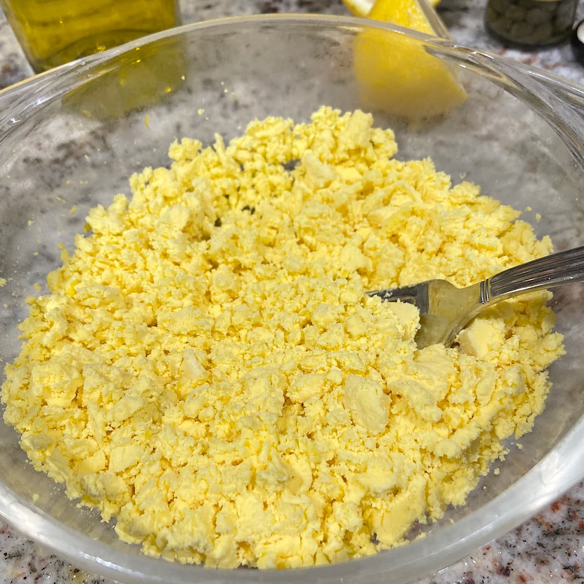mashed egg yellow in bowl. 