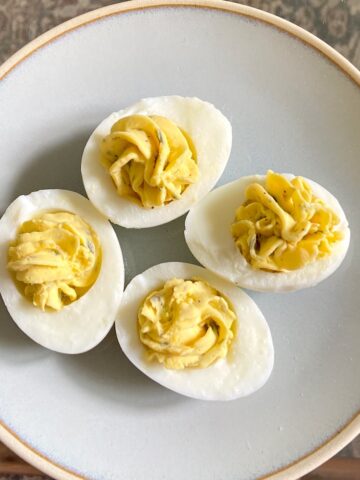 mediterranean deviled eggs on plate