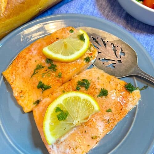 salmon with lemon on plate