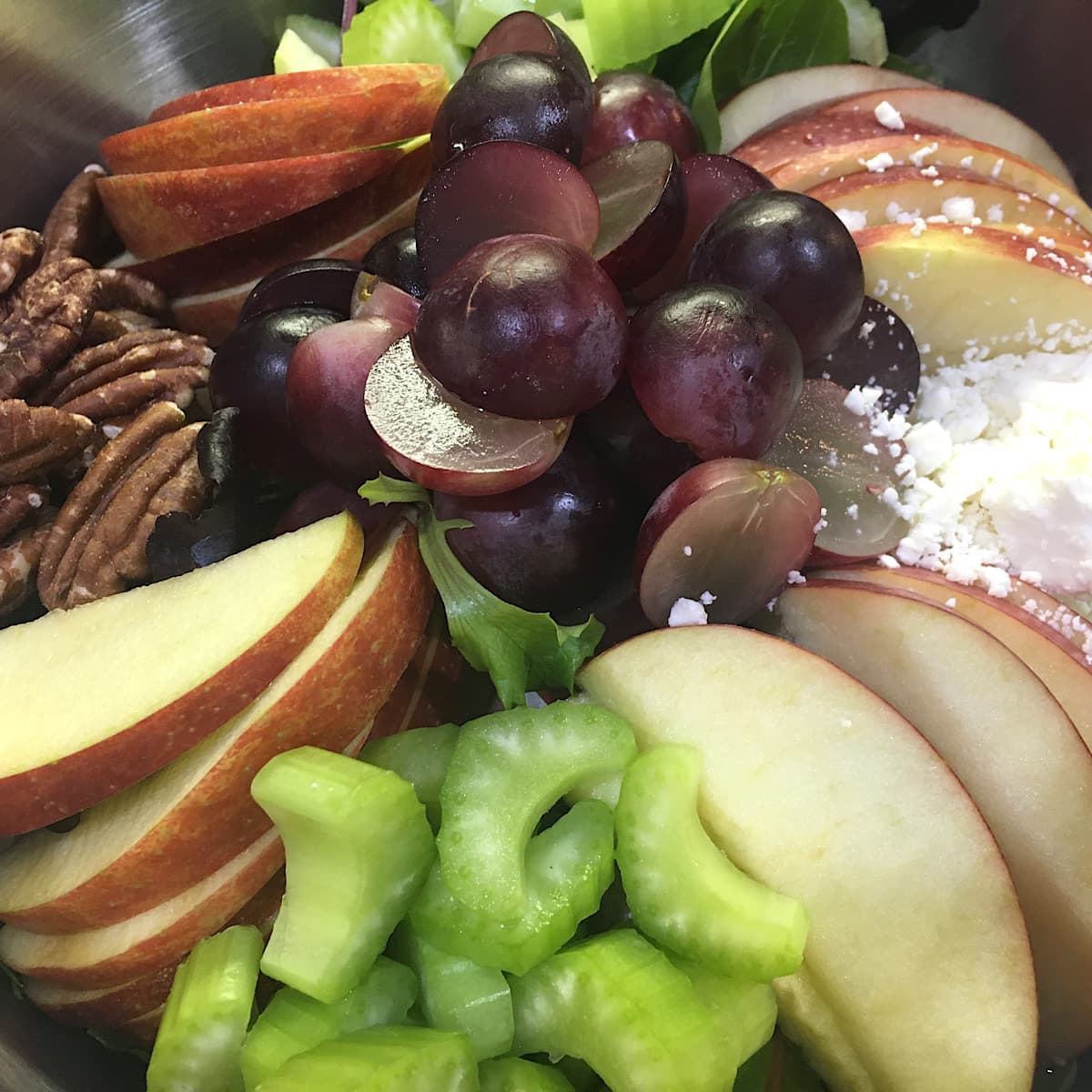 sliced apples, celery, grapes, Feta cheese and toasted pecans