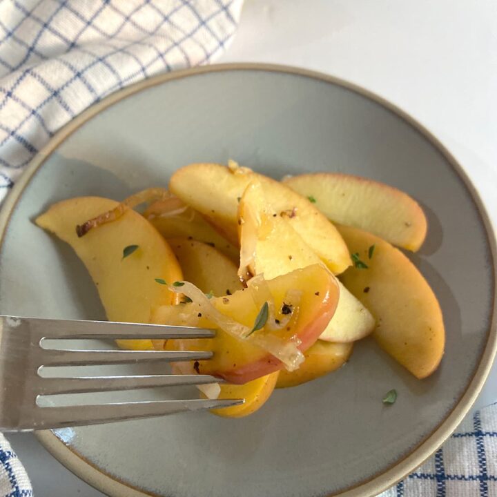 Simple sauteed apples and leeks on plate