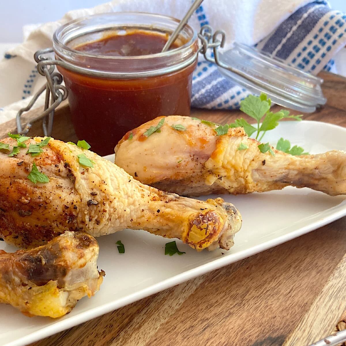 baked chicken legs on a platter