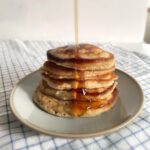 stack of banana pancakes on a plate.