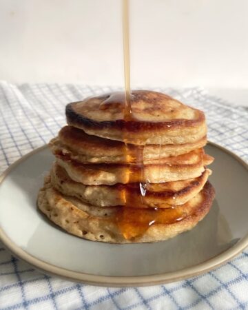 stack of banana pancakes on a plate.