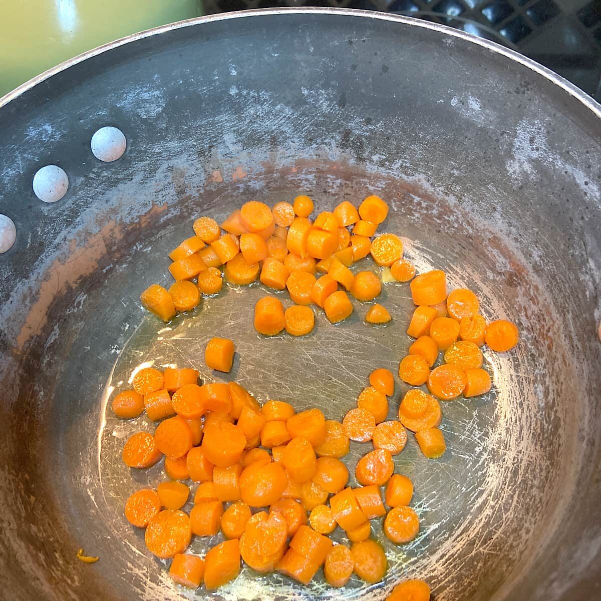 saute carrots in olive oil