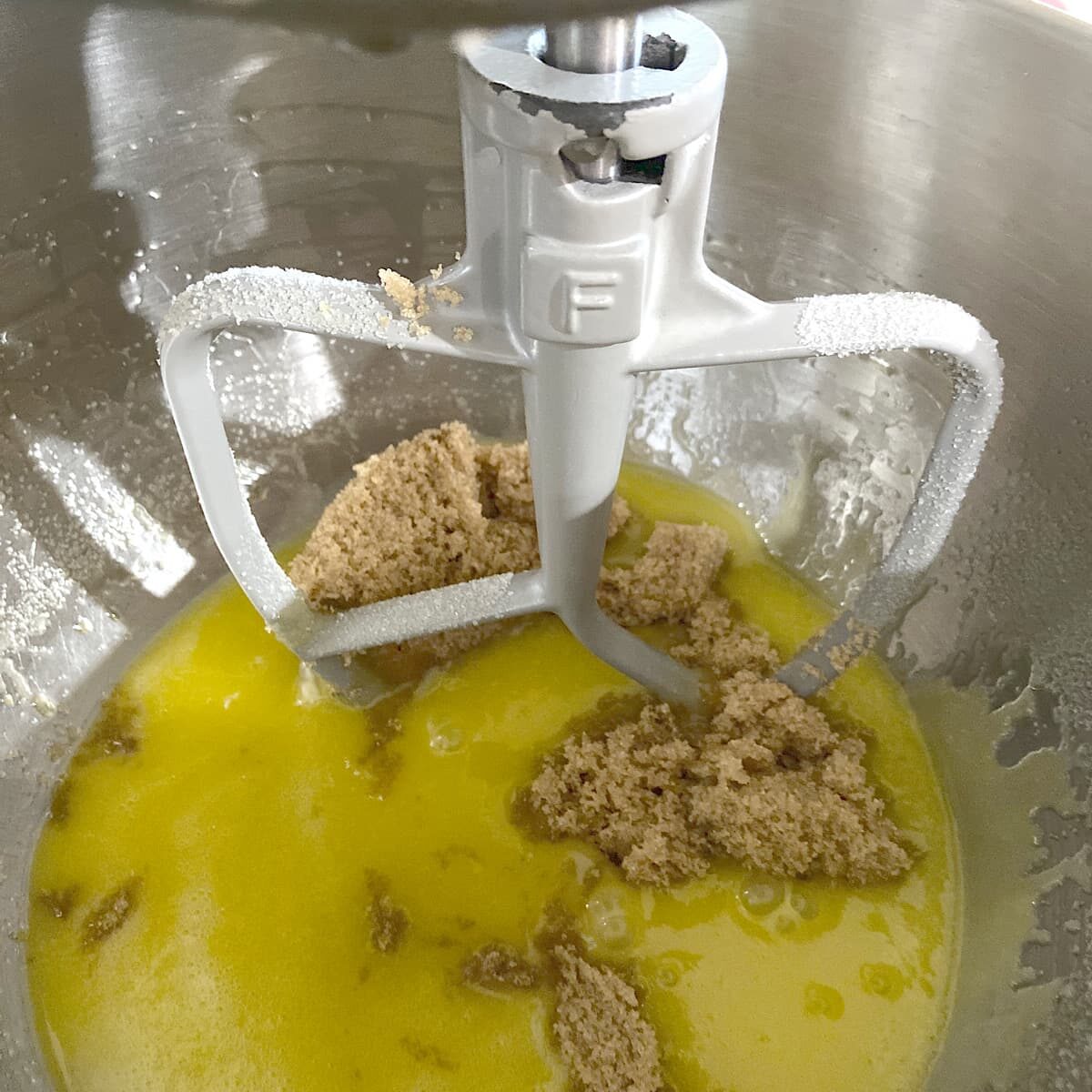 whisk eggs and sugar and other wet ingredients to a mixing bowl.
