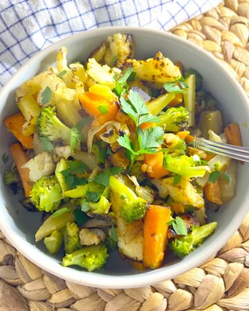 broccoli cauliflower and potato saute in bowl