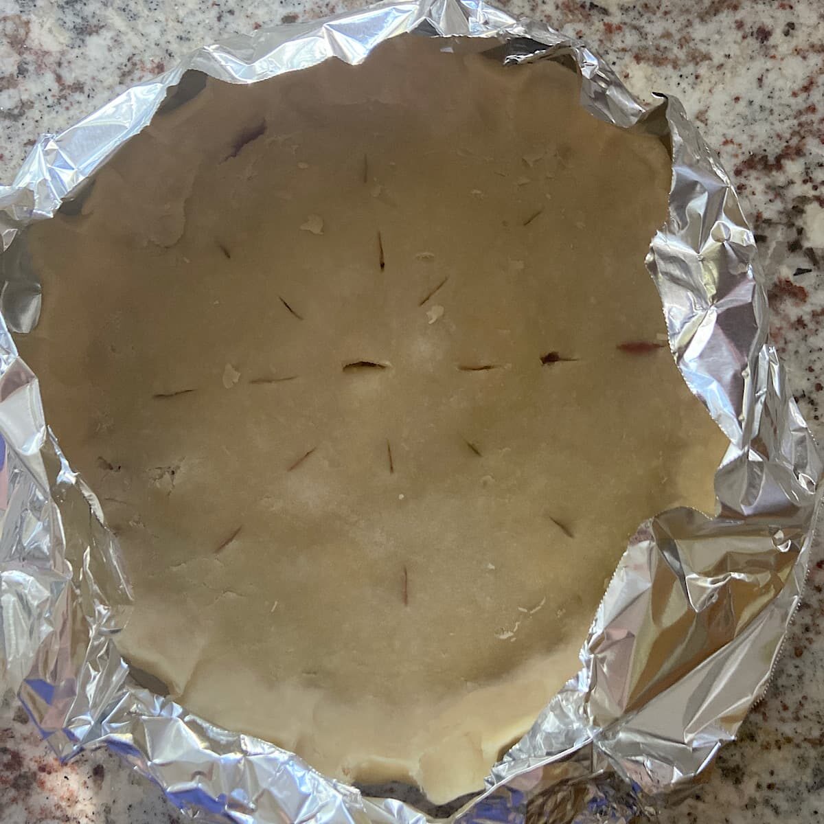 wrap foil around pie edges to prevent over browning