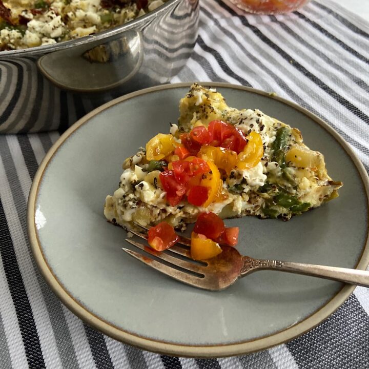 slice of asparagus frittata on plate