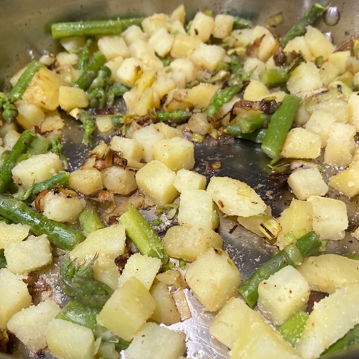 Add asparagus and potato to leek mixture