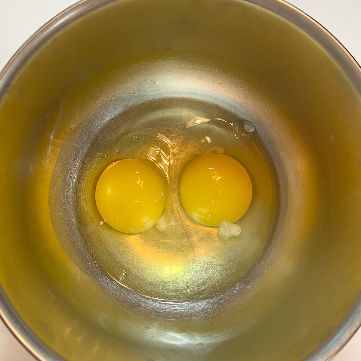 two eggs in pan