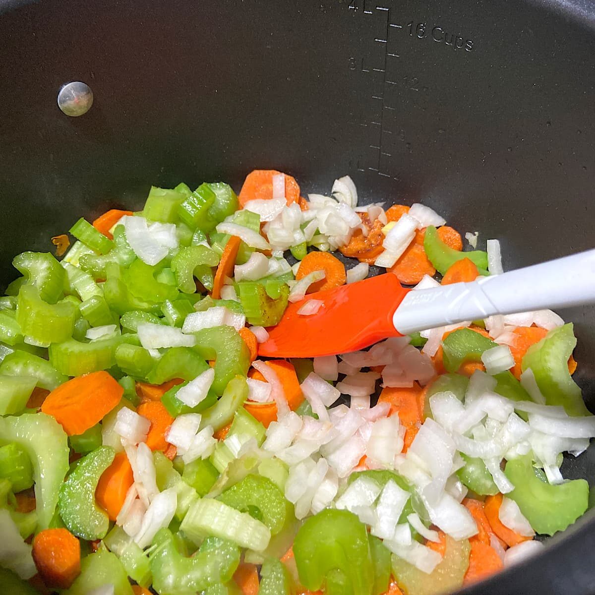 saute carrots, celery, onion, and garlic in olive oil in large pan.