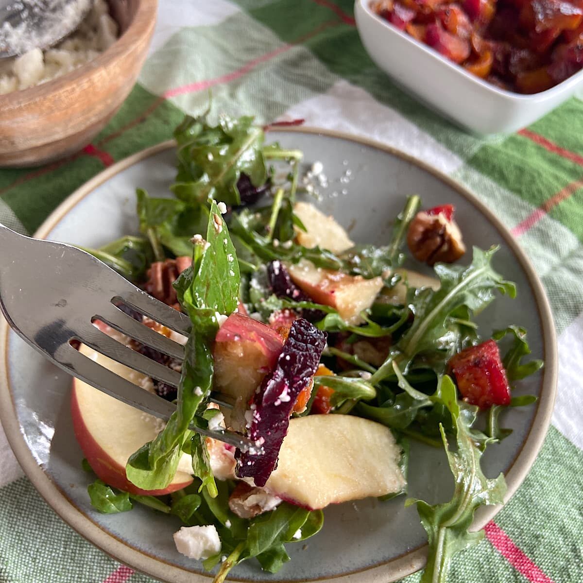 a forkful of roasted beet salad.