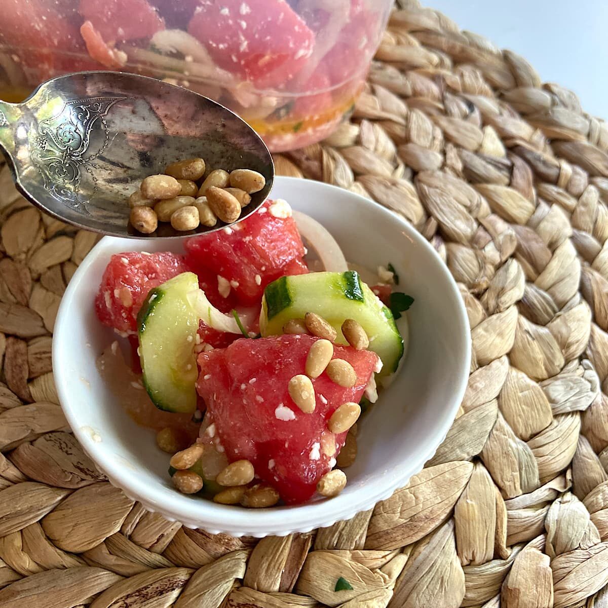 add a sprinkle of pine nuts to watermelon salad