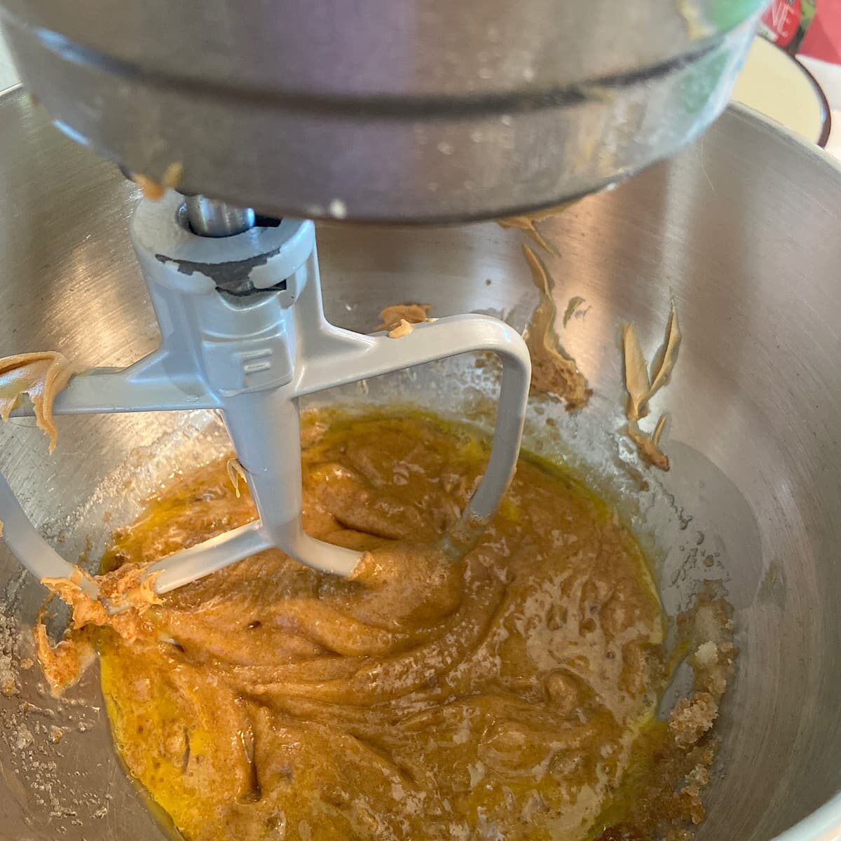 picture of mixing bowl with eggs and peanut butter mixture.