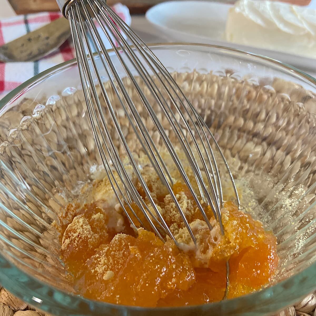 picture of mixing apricot glaze with a whisk