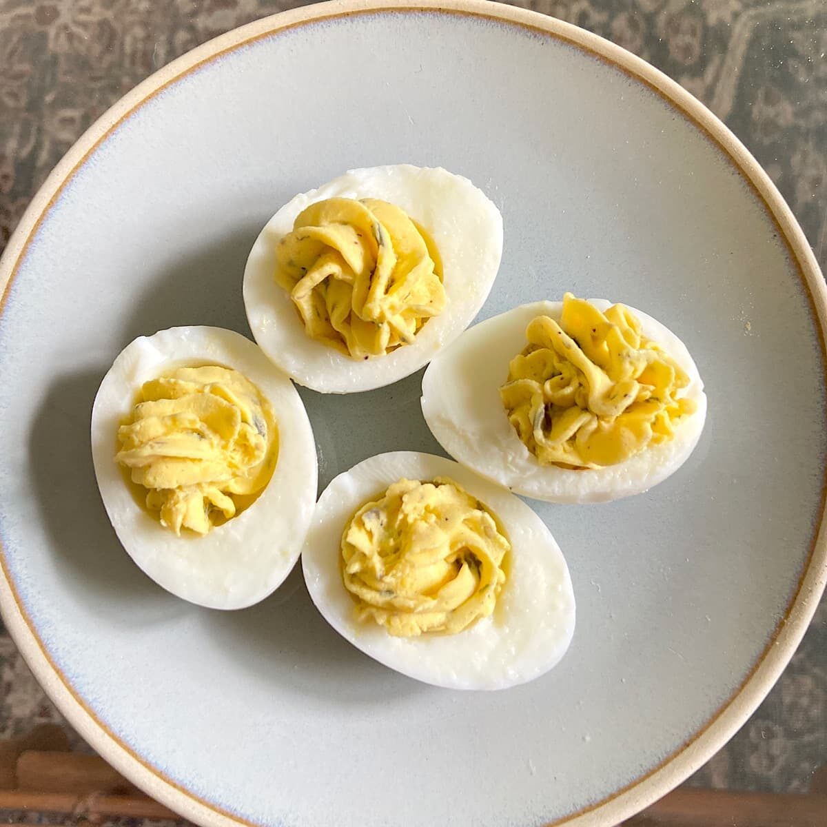 plate of four deviled eggs.