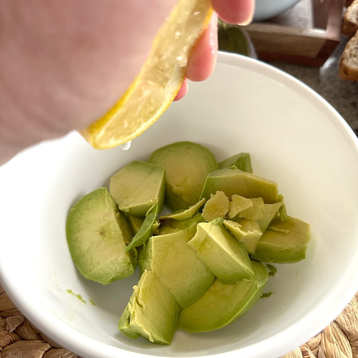 Picture of a bowl of chopped avocado.