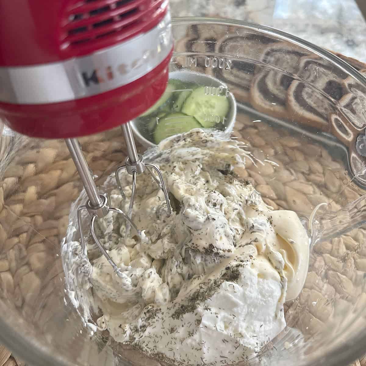 picture of a mixing bowl with ingredients being mixed.